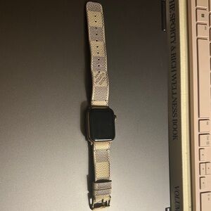 Apple Smartwatch with Black Face and Patterned Strap